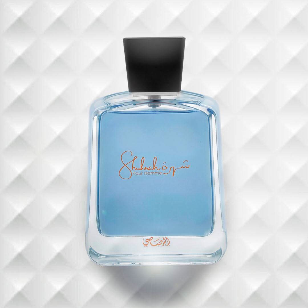 Shuhrah Pour Homme Eau de Parfum spray by Rasasi, 90ml, featuring a sleek bottle with elegant design and dark accents.