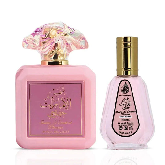 Pink Blush Shams Al Emarat Ard Al Zaafaran Eau de Parfum spray set with 100ml and 50ml bottles, featuring pink accents and elegant packaging.