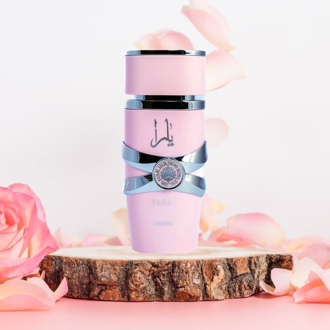 Lattafa Yara Eau de Parfum Spray 100ml bottle with elegant design and clear glass showcasing the fragrance inside.