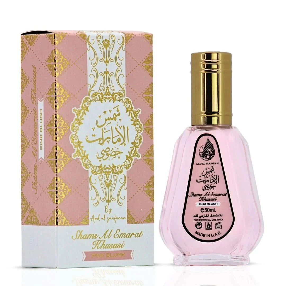 Pink Blush Shams Al Emarat Eau de Parfum spray by Ard Al Zaafaran in 100ml and 50ml bottles, featuring floral and fruity notes.