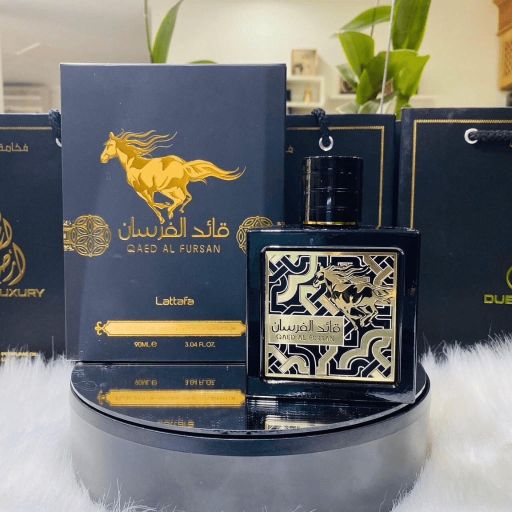 Qaed Al Fursan Eau de Parfum spray by Lattafa, 90ml, featuring elegant perfume bottle and packaging design.