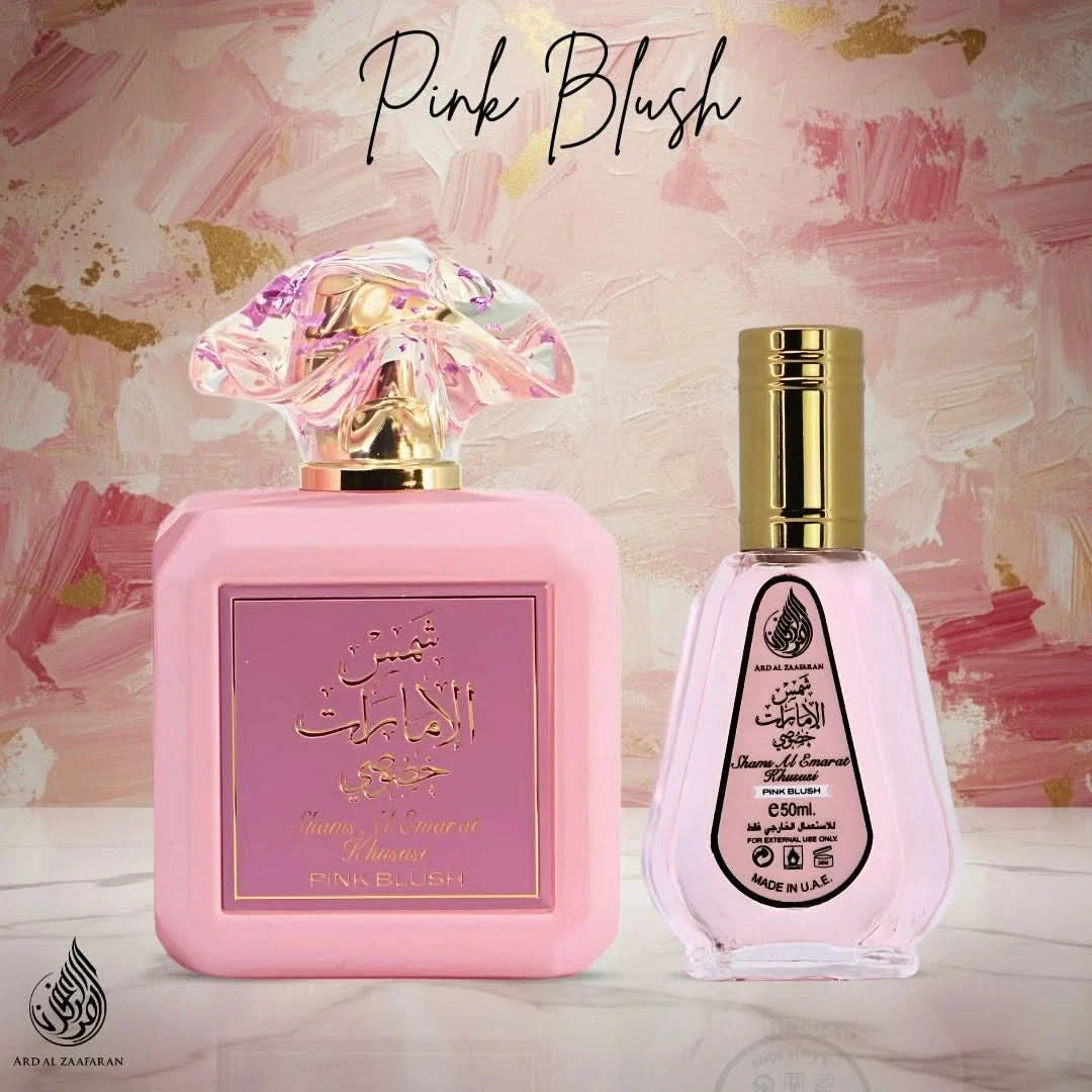Pink Blush Shams Al Emarat Eau de Parfum by Ard Al Zaafaran in 100ml and 50ml bottles, showcasing elegant pink packaging and spray nozzles.