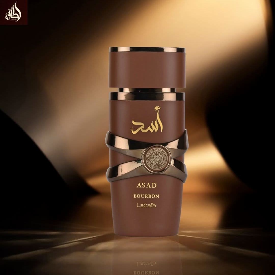 Lattafa Asad Bourbon Eau de Parfum spray 100ml, featuring a sleek bottle with dark amber liquid and elegant design.