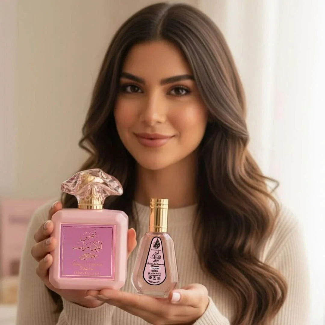 Pink Blush Shams Al Emarat Eau de Parfum by Ard Al Zaafaran in 100ml and 50ml bottles, featuring elegant perfume bottles.