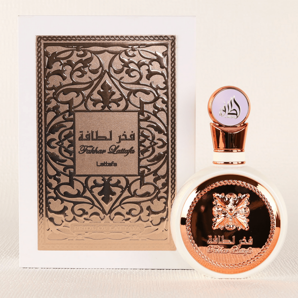 Fakhar for Women Eau de Parfum spray by Lattafa, 100ml bottle with elegant perfume packaging and floral design.