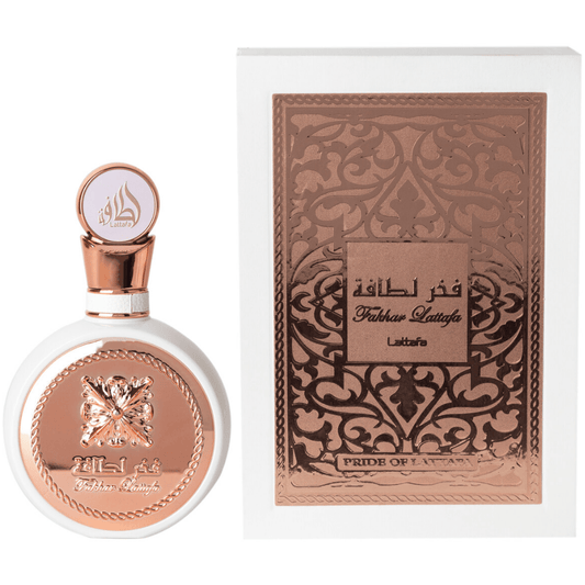Fakhar for Women Eau de Parfum spray by Lattafa, 100ml bottle with elegant design and floral accents visible in the image.