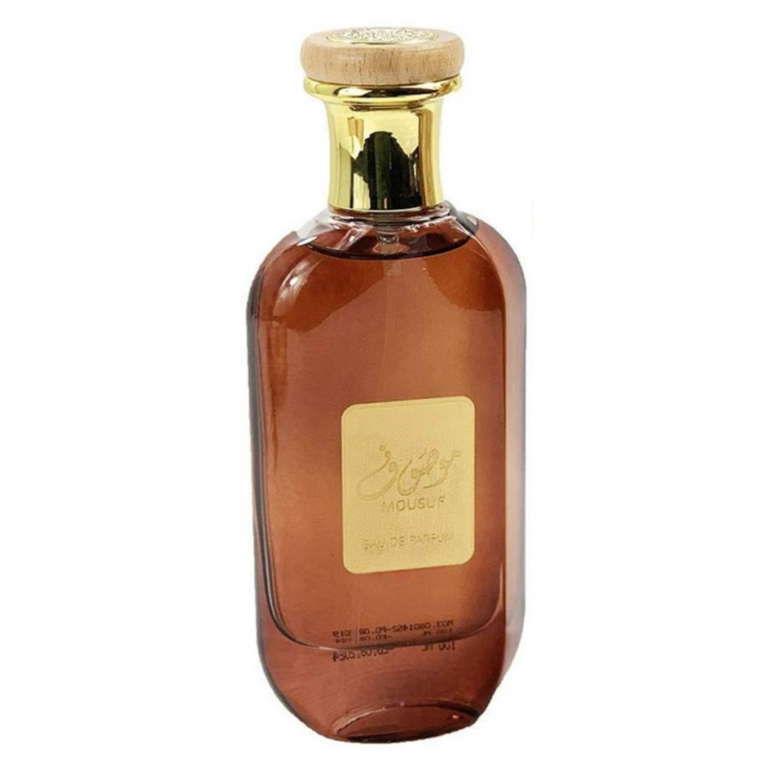 Mousuf Eau de Parfum Spray by Ard Al Zaafaran, 100ml bottle, elegant glass container with floral and woody fragrance hints.