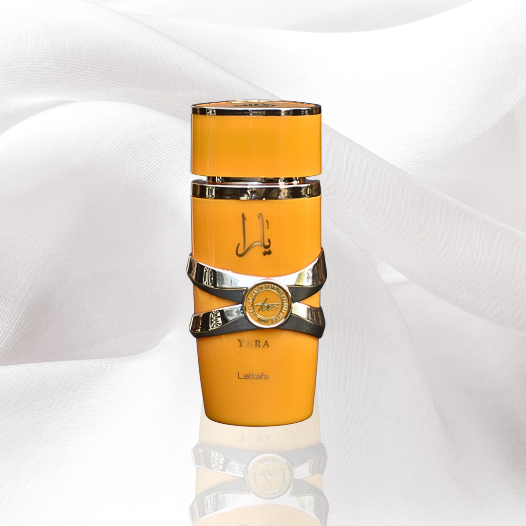 Lattafa Yara Tous EDP 100ml perfume bottle with tropical fruits and mango scent, elegant design, ideal for warm-weather wear.