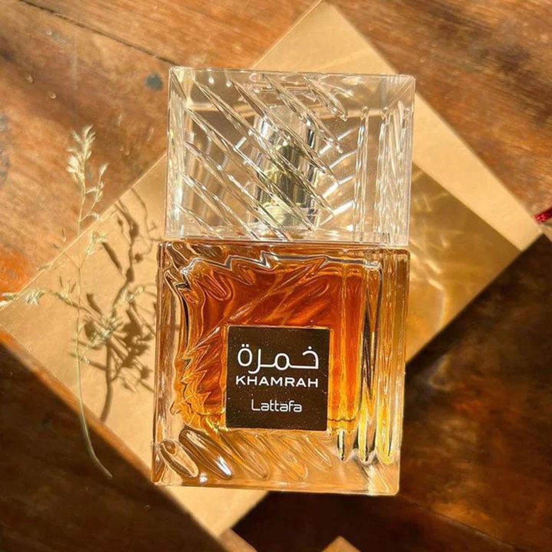 Lattafa Khamrah Eau de Parfum spray bottle, 100ml (3.4 oz), with elegant packaging and sleek design.