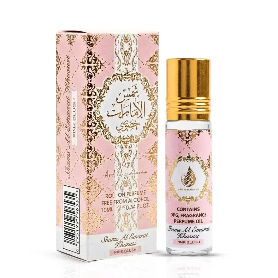 Bundle of Lattafa Yara Eau De Parfum spray and Ard Al Zaafaran Pink Blush Shams Al Emarat roll-on perfume oil, with elegant bottles.