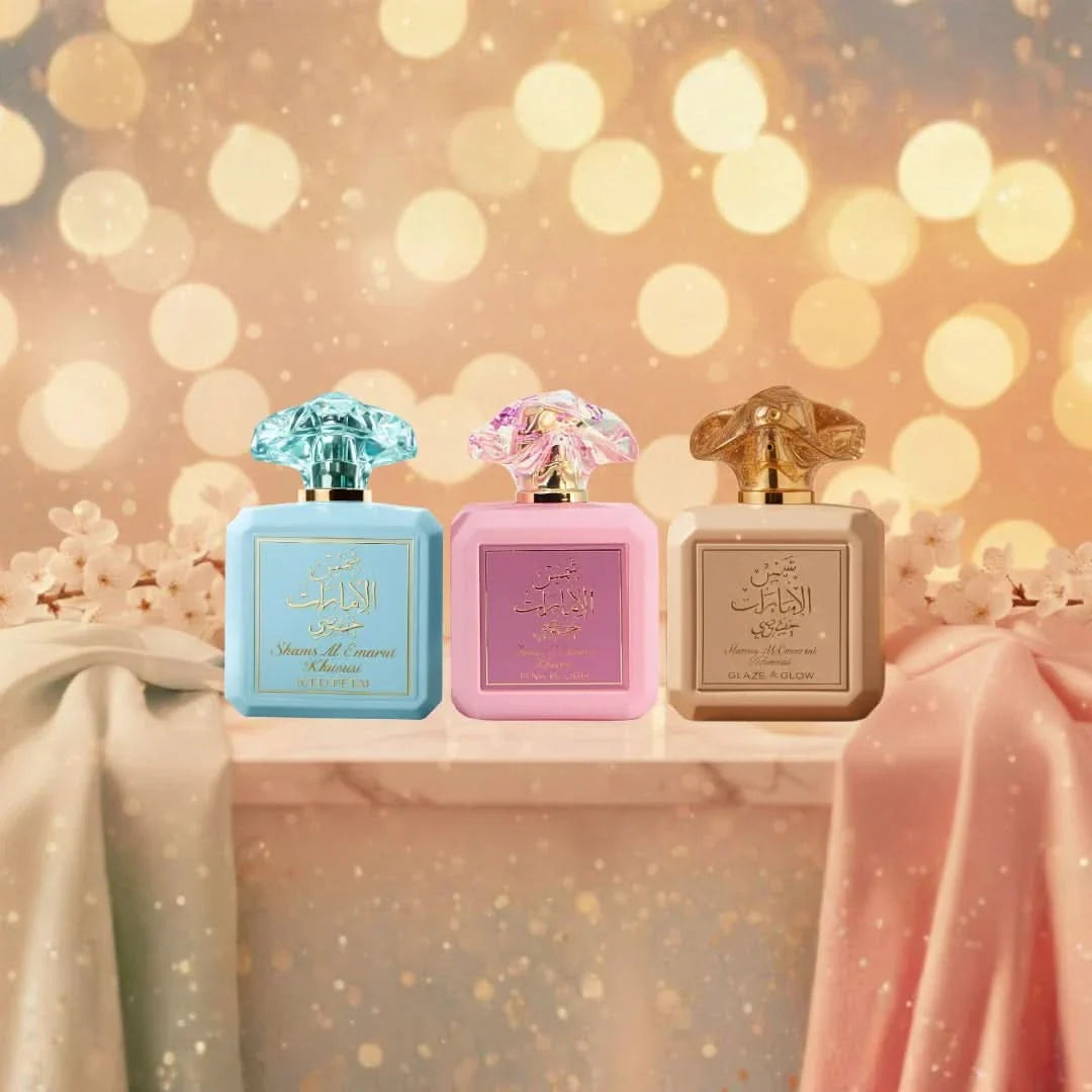 Bundle of Ard Al Zaafaran Shams Al Emarat Khususi Pink Blush, Glaze & Glow, and Iced Petal Eau de Parfum sprays in 100ml bottles.