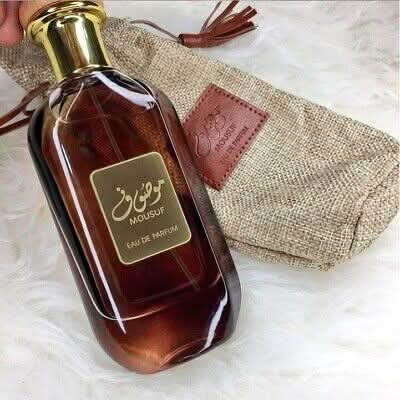 Ard Al Zaafaran Mousuf Eau de Parfum Spray 100ml with elegant bottle, showcasing the fragrance's luxurious packaging.