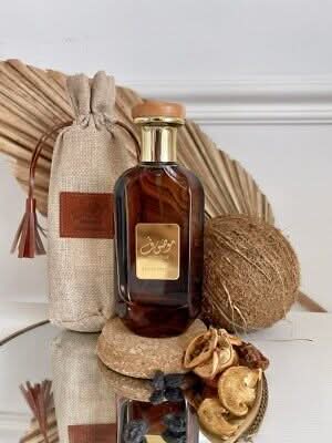 Ard Al Zaafaran Mousuf Eau de Parfum spray bottle, 100ml, with elegant packaging and floral fragrance details visible.