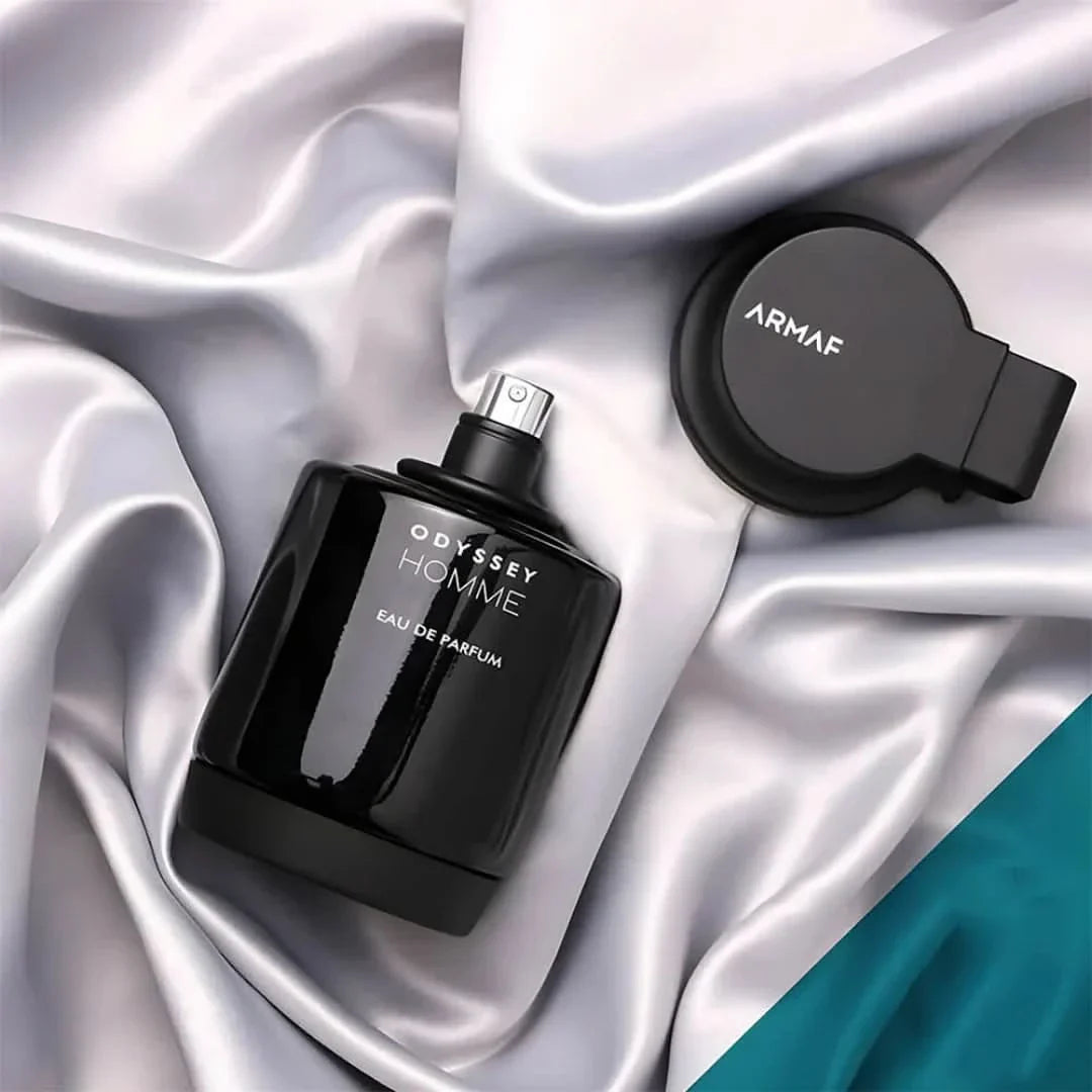 Odyssey Homme Black Eau de Parfum spray by Armaf, 100ml, featuring sleek black bottle and sophisticated packaging.